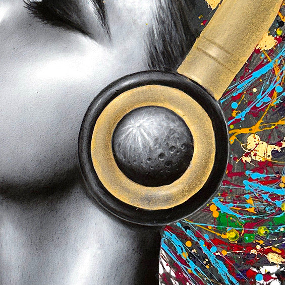 Beautiful woman wearing headphones, painted in black and white coconut charcoal with colorful splattered paint as hair