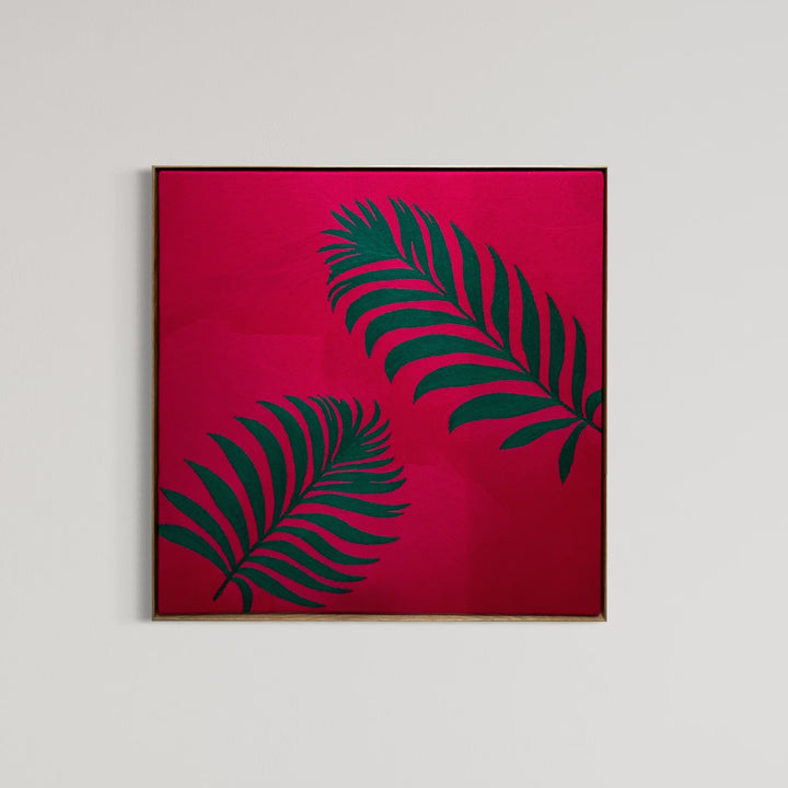 42.5"x42.5" chain-stitched textile with two tropical leafs over a bright pink background. 