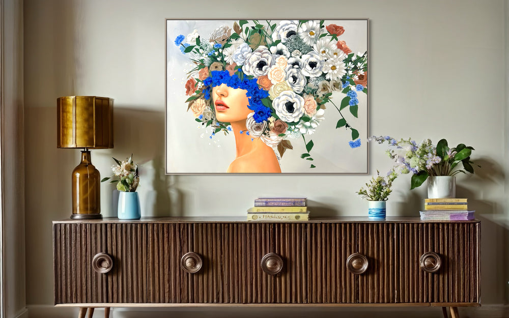  48"W x 36"H Acrylic portrait on canvas. Woman with the upper half of her face and hair covered in white, blue and terracotta flowers. 
