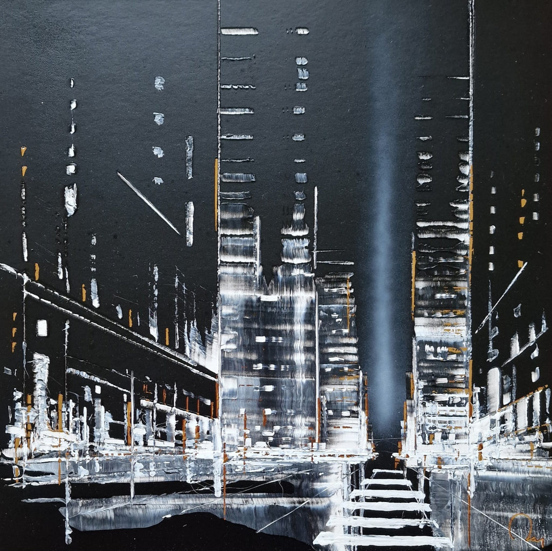 City Lights" by French artist Julien Rey — a mixed-media painting of a dramatic nocturnal urban canyon crafted with Chinese lacquer and gold leaf on board. Towering skyscrapers rendered in bold black lacquer and silver rise on either side of a luminous central boulevard, a sweeping searchlight beam cutting through the deep night sky. Scattered gold leaf accents flicker like distant windows. Original contemporary nocturnal cityscape painting available at Morton Contemporary gallery.