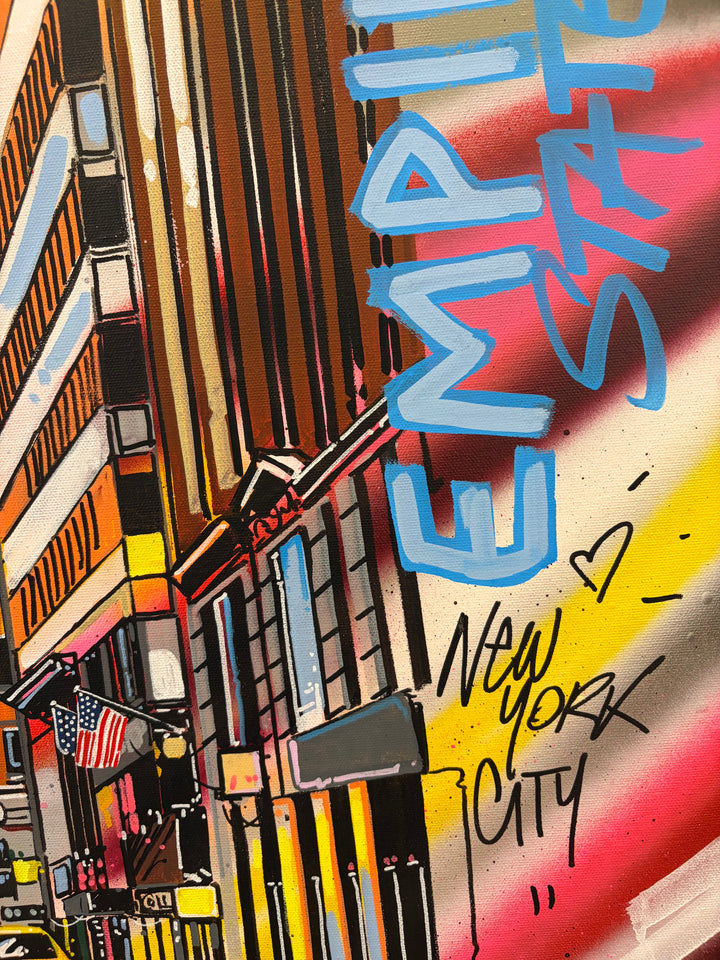 Close-up detail of "Empire State of America" acrylic graffiti painting by Pappay, showing hand-painted text reading Empire State and New York City with an American flag