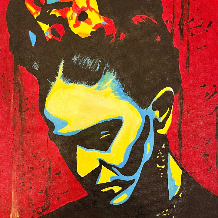 "Frida" by US-based artist Suave Gonzalez, an expressive acrylic on canvas portrait of iconic Mexican artist Frida Kahlo, depicted with her signature floral crown rendered in vivid yellow and red, her face illuminated in bold strokes of yellow and blue against a deep black silhouette and a rich red background. Dynamic paint splatters add raw energy to this powerful tribute to one of art history&