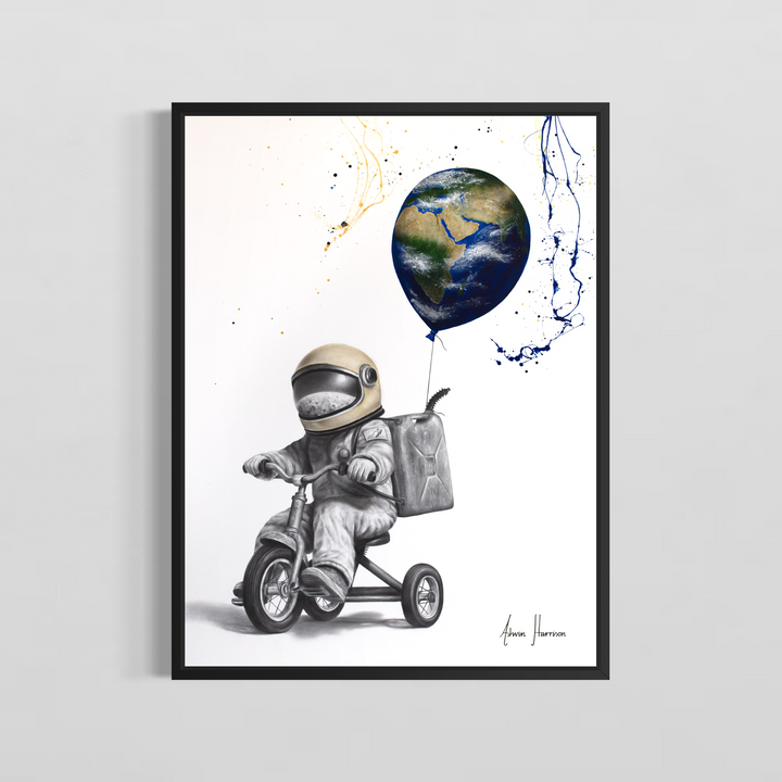 ‘Gallon Galaxy’ by Ashvin Harrison is a contemporary surrealist painting depicting a childlike astronaut riding a tricycle while carrying a fuel canister backpack and holding a balloon shaped like planet Earth. Rendered in coconut charcoal dust and acrylic on canvas, the artwork combines detailed monochromatic realism with vibrant cosmic color, expressive paint splatter techniques, and whimsical sci-fi imagery to evoke imagination, adventure, and environmental symbolism.