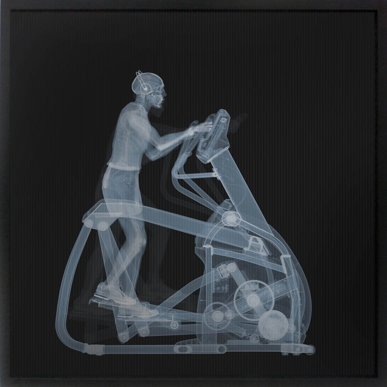 skeleton x ray figure working out elliptical machine retro exercise lenticular image  blue grey on black background