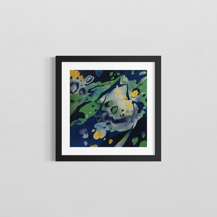 Turbulent by Erin Touey framed in a black frame with white window matting, showing the blue, green, and yellow abstract oil painting