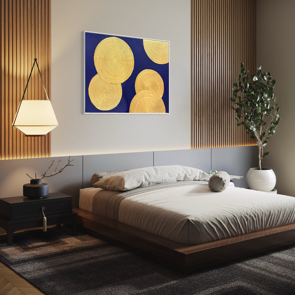 Indigo Awakening II by Lee in Cerulean. Acrylic mixed media painting of textured golden circles, overlapping on top of a dark blue background.