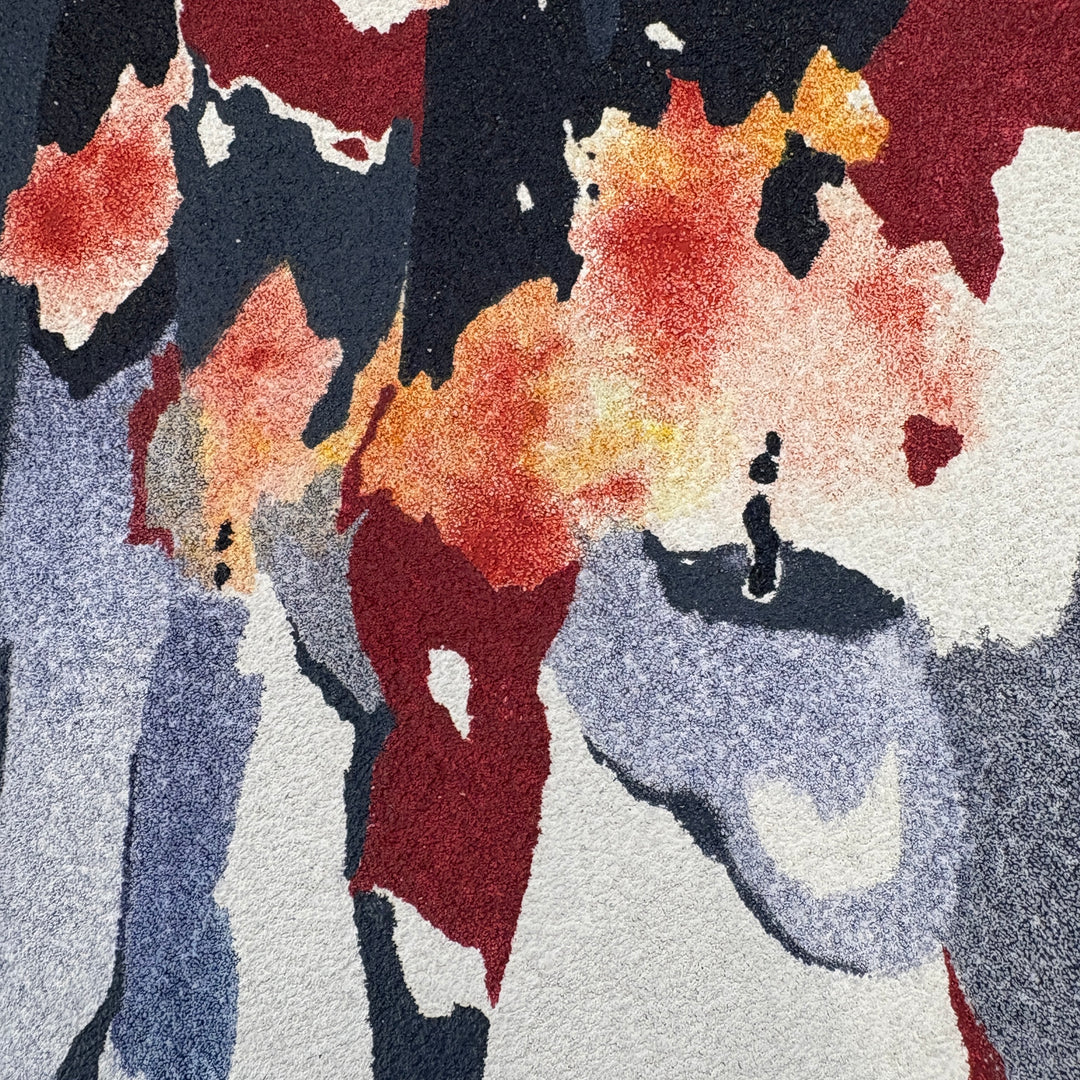 overabundance of lit flame candles taper sticks burning in blue red orange and yellow organic shapes negative space textured surface pumice and oil
