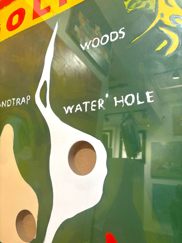 Graphic vintage nostalgic jiggle puzzle game with balls green golfing with hitting figure golf map tee. and holes in acrylic and plexiglass frame