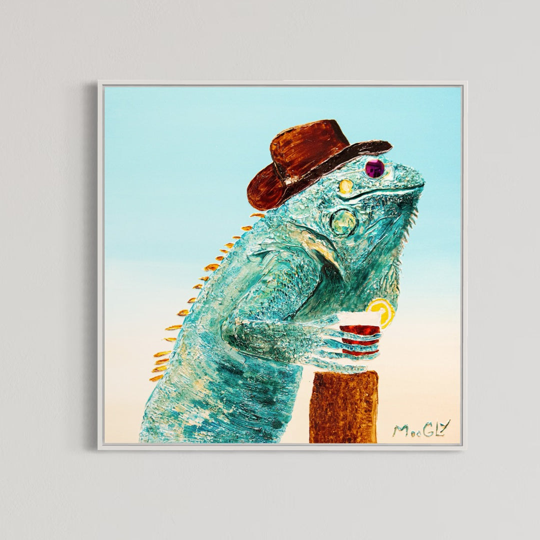 30” x 30” painting by French artist Moogly of a blueish-green iguana in sunglasses and a cowboy hat, holding a cocktail with a light blue background. The iguana is made out of resin, giving it a textured and shiny finish. The sunglasses are real round, reflective sunglasses that the artist has adhered to the canvas.
