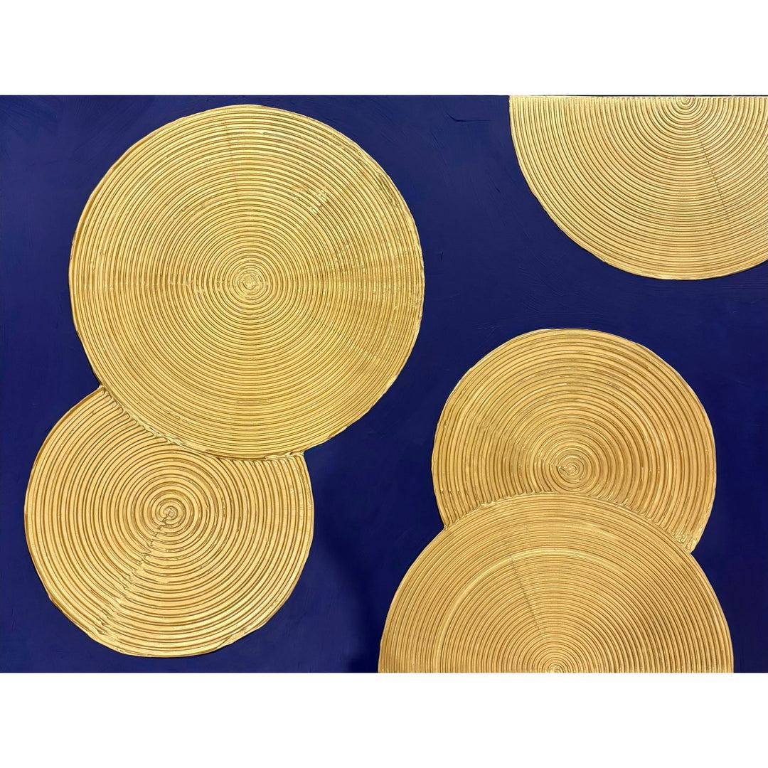 Indigo Awakening II by Lee in Cerulean. Acrylic mixed media painting of textured golden circles, overlapping on top of a dark blue background.