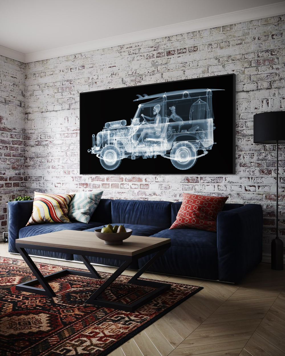 Framed Chromaluxe black and white x-ray photograph by Nick Veasey of a skeleton man driving a land rover with a surf board on the roof and a dog and surf suit in the back of the car. 