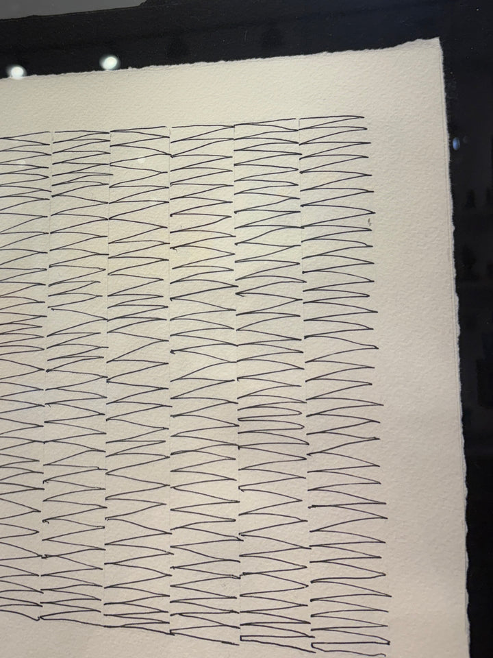 pen line geometric minimalism on paper symbolizing life line time passed in black and white in frame