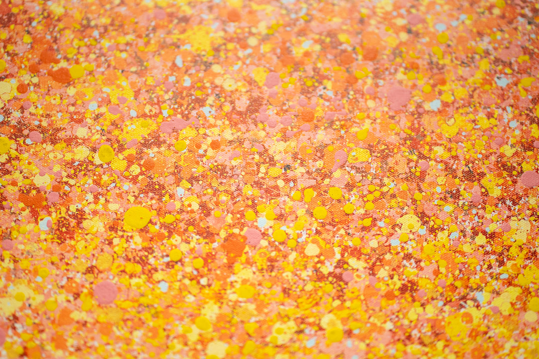 black and white realism ballerina figure posing with pink yellow red and orange paint splatter tutu on white background