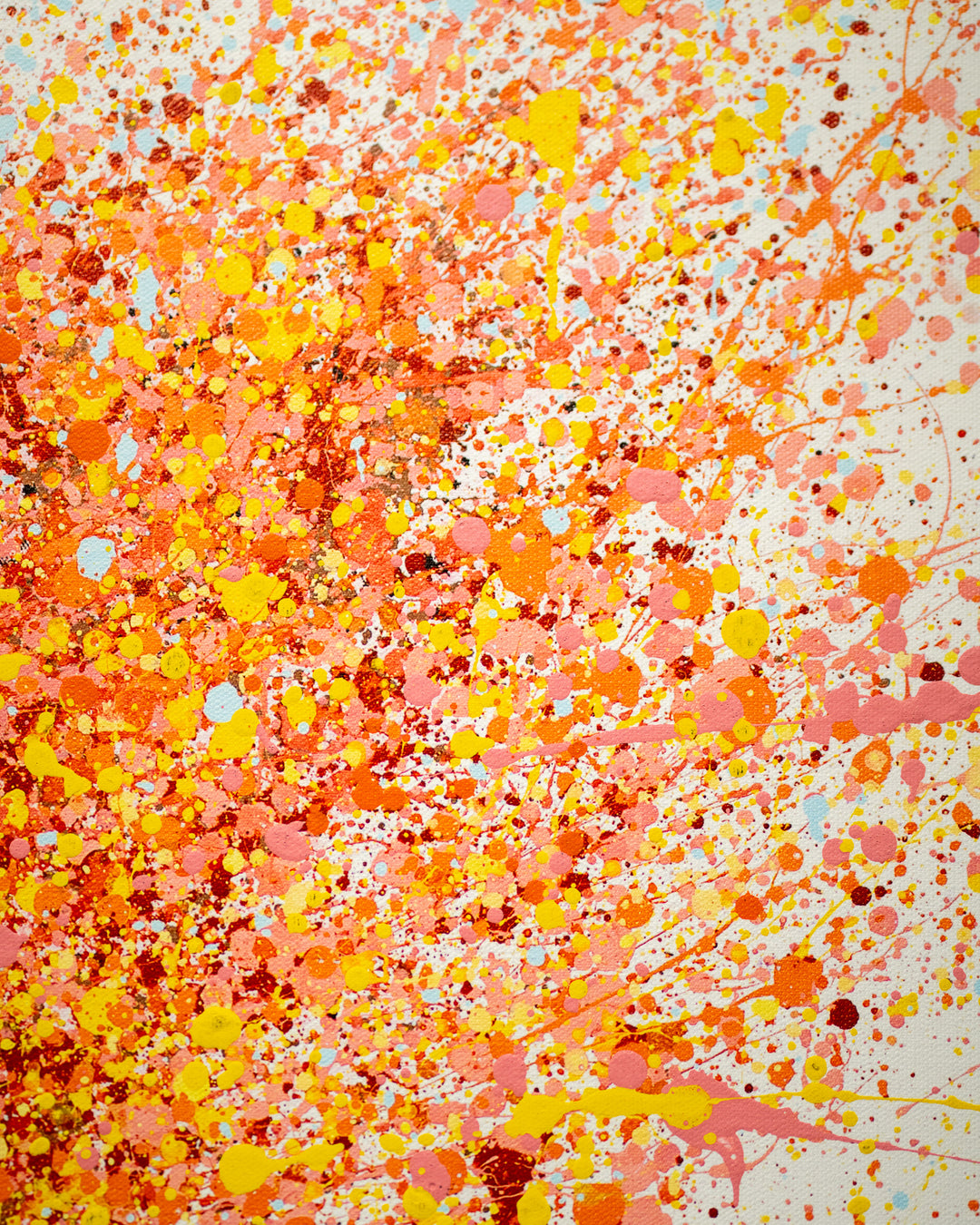 black and white realism ballerina figure posing with pink yellow red and orange paint splatter tutu on white background
