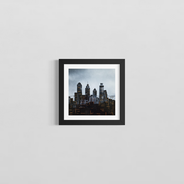 "Philadelphia" by French artist Julien Rey — a mixed-media painting of the Philadelphia skyline crafted with Chinese lacquer and gold leaf on canvas. Iconic skyscrapers including One Liberty Place and the Comcast Center rise dramatically from a densely layered nocturnal cityscape, their windows and facades glinting with gold leaf accents. A brooding silver-gray sky with dark clouds looms above. Original contemporary Philadelphia skyline painting available at Morton Contemporary gallery.