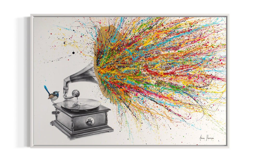 large gramophone music player with record vinyl and wren blue bird sitting on it with big gold speaker and rainbow paint splatters coimng out on white background