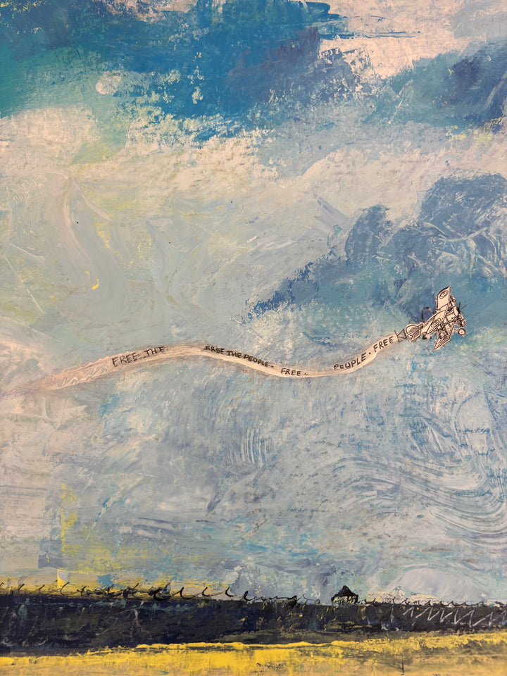 Angled detail of Stay in ya lane by Keith Andrews, showing a small kite with a long paper tail flying in a blue and white sky above a dark fence line.