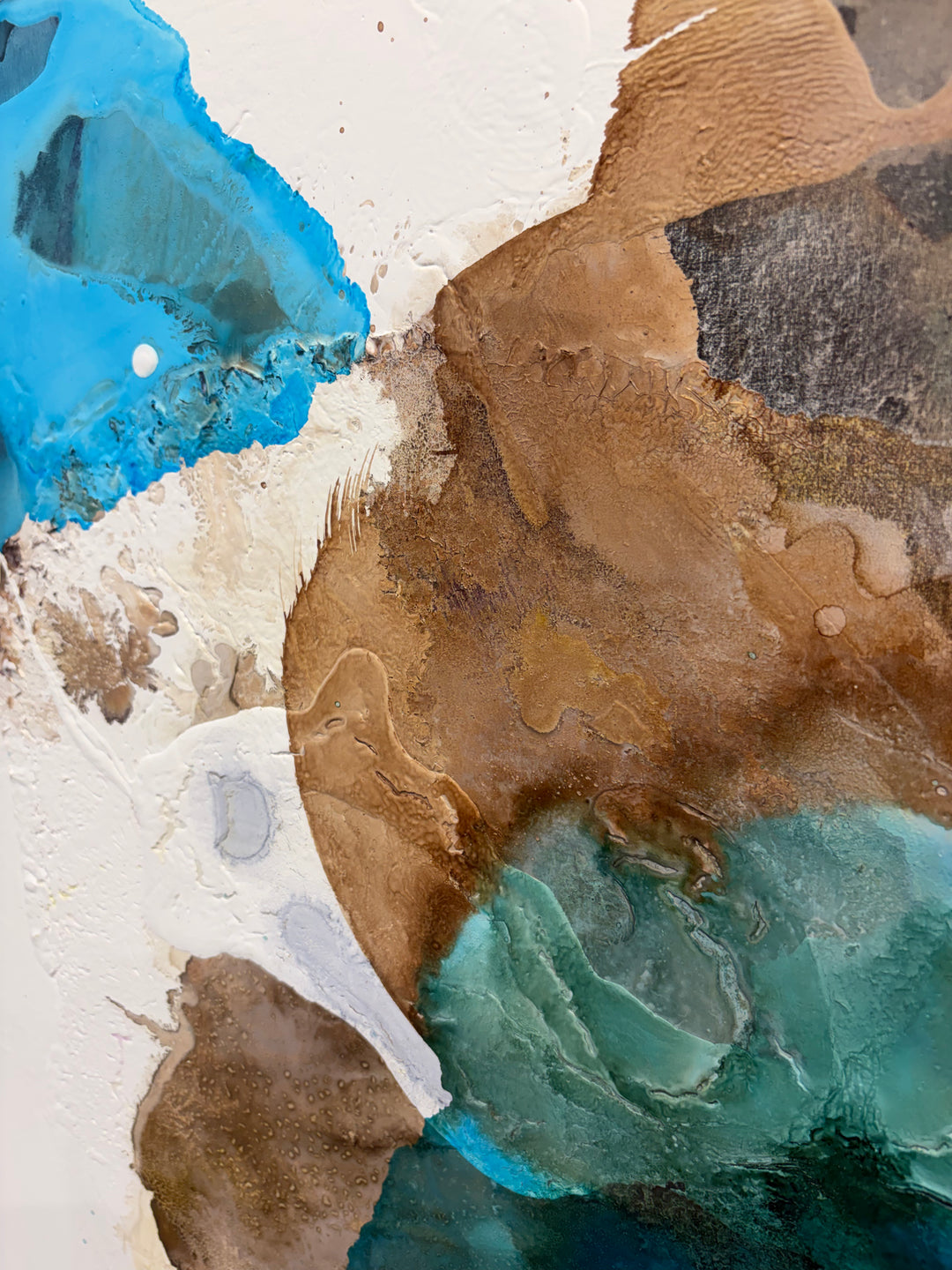 Detail angled view of "Surf" painting by Liz Barber, highlighting the fluid brushwork and mixed-media texture in its frame