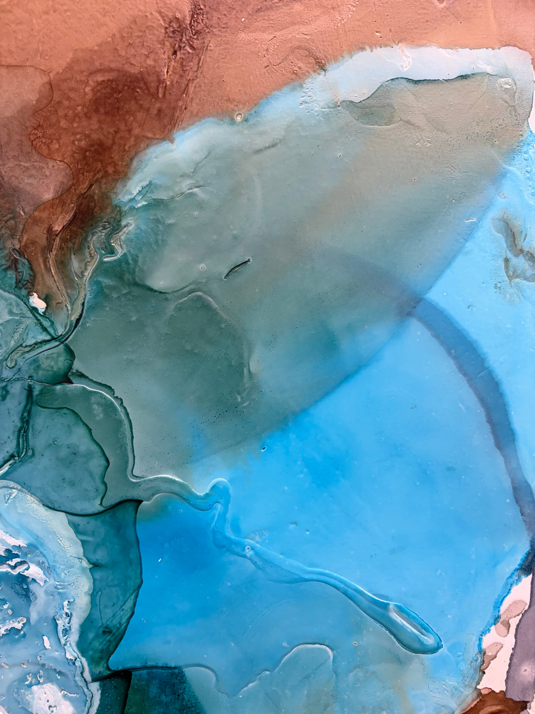 Close-up angled view of "Surf" painting by Liz Barber, showing the textured mixed-media surface in its frame