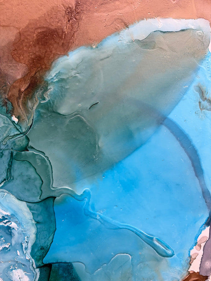 Close-up angled view of "Surf" painting by Liz Barber, showing the textured mixed-media surface in its frame