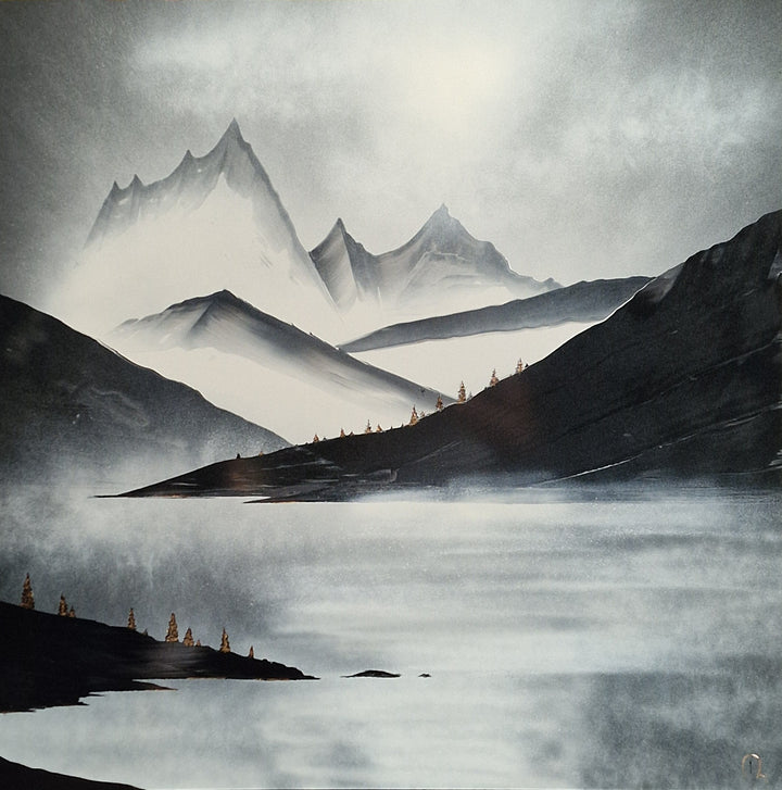 Julien Rey, The Nature, lacquer and gold leaf on board, 31 x 31 inches. Monochrome mountain landscape with jagged snow-capped peaks, dark tree-lined ridges, and a still lake in the foreground, with small gold-toned trees dotting the hillside.