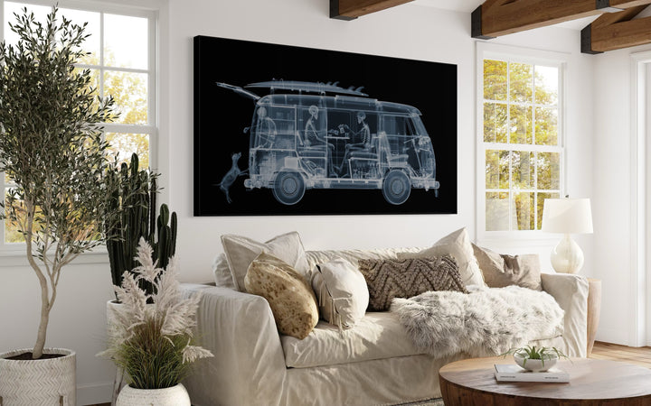 Framed Chromaluxe black and white x-ray photograph by Nick Veasey of a skeleton family sitting in a VW camper van with a surf board on top and a dog. 