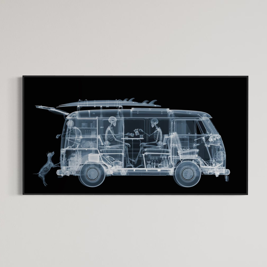 Framed Chromaluxe black and white x-ray photograph by Nick Veasey of a skeleton family sitting in a VW camper van with a surf board on top and a dog. 