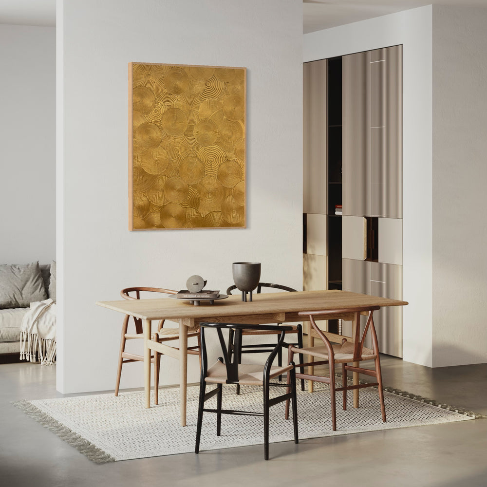 Visionary by Lee in Cerulean. Textured painting of gold circles, overlapping with smaller circles within creating a spiraled and whimsical effect.