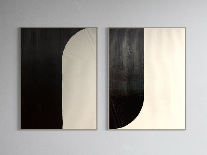 Yin + Yang by Lee in Cerulean. Diptych of textured paint in vertical lines, featuring white and black opposite arch shapes as yin &amp; yang.