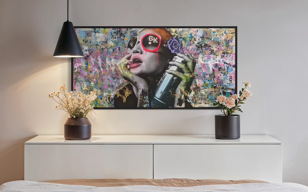 72"W x 36"H Acrylic paint, spray paint, wheat-paste, vintage advertisements, printed fragments on canvas. Posed woman with colorful graphics and DAIN's signature circle around the right eye. 