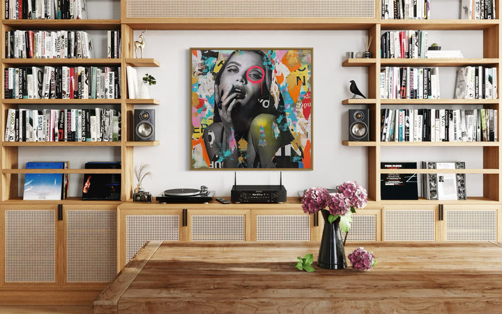 36" x 36" Acrylic paint, spray paint, wheat-paste, vintage advertisements, printed fragments on canvas. A woman surrounded by colorful paper fragments with DAIN&