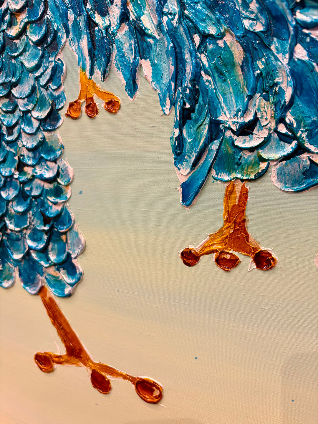 48" x 48" acrylic on canvas painting of blue birds with hats and eyes made of washers over a blue and green gradient background. 