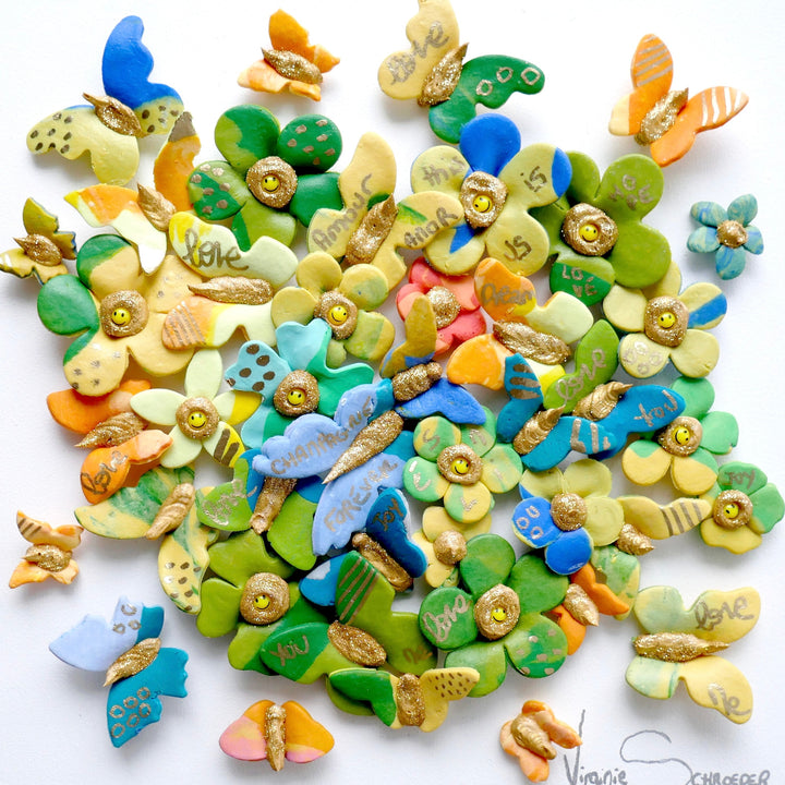 3 dimensional textured artwork of butterflies with text and floral collage on white background