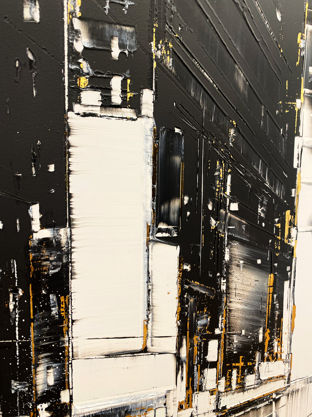 Detail of Julien Rey "Astoria", black, white and gold cityscape, lacquer &amp; gold leaf on 39.5x39.5" dibond