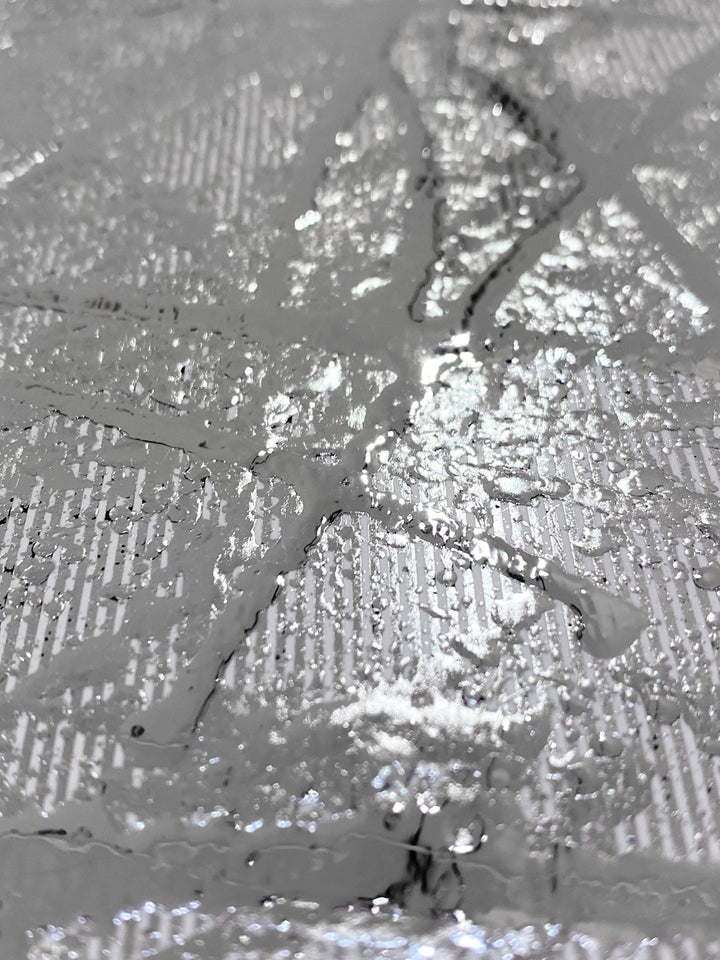 Detail of M. Clark "Silver Texture No. 35". Silver foil on illustration board mounted to 10.5"x8"x0.5" sintra panel. Abstract silver textural painting.