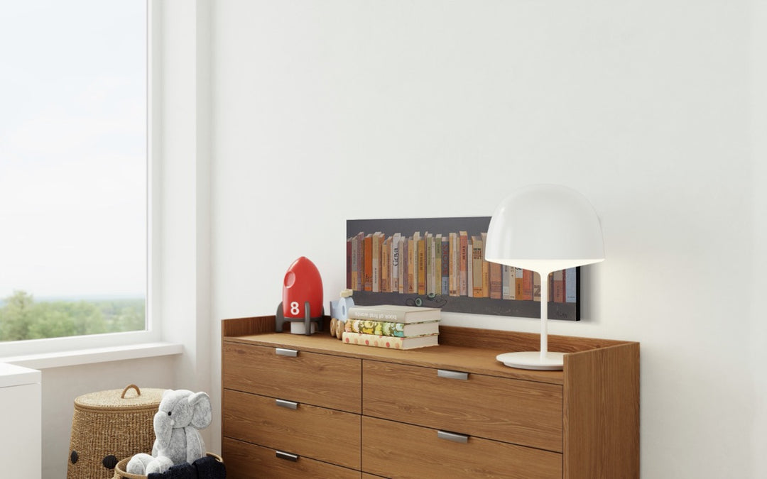 Books and Headphones, artwork by Tomasa Martín. Oil and acrylic on linen, horizontal painting of lots of books next to each other and a pair of headphones.
